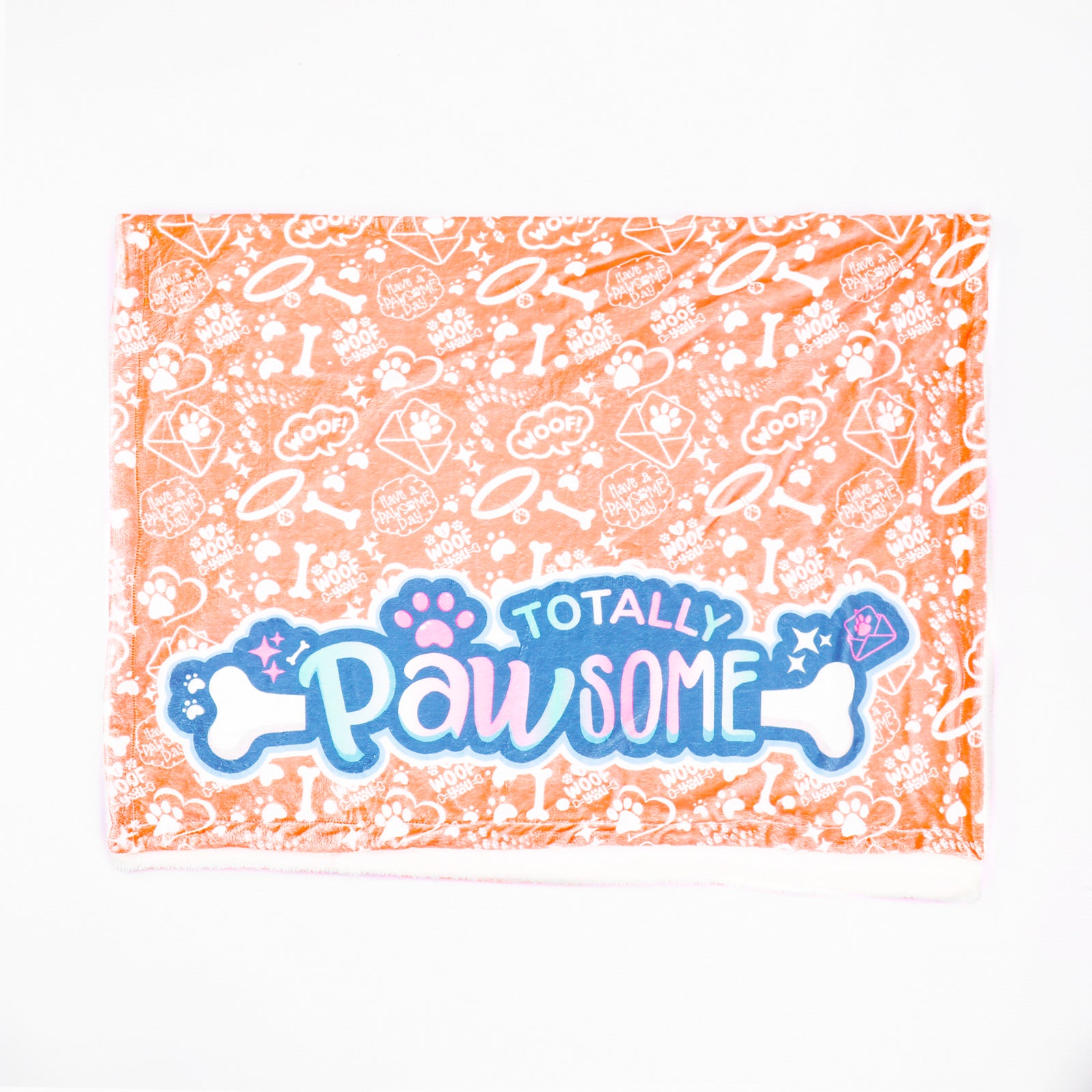 Blanket with 'Totally Pawsome' text and paw prints on a white background
