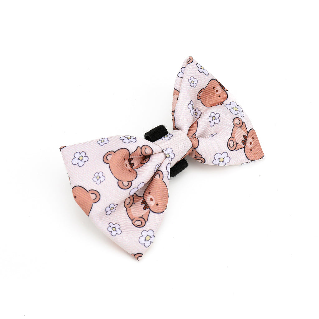 Dog bow tie with teddy bear pattern on a white background