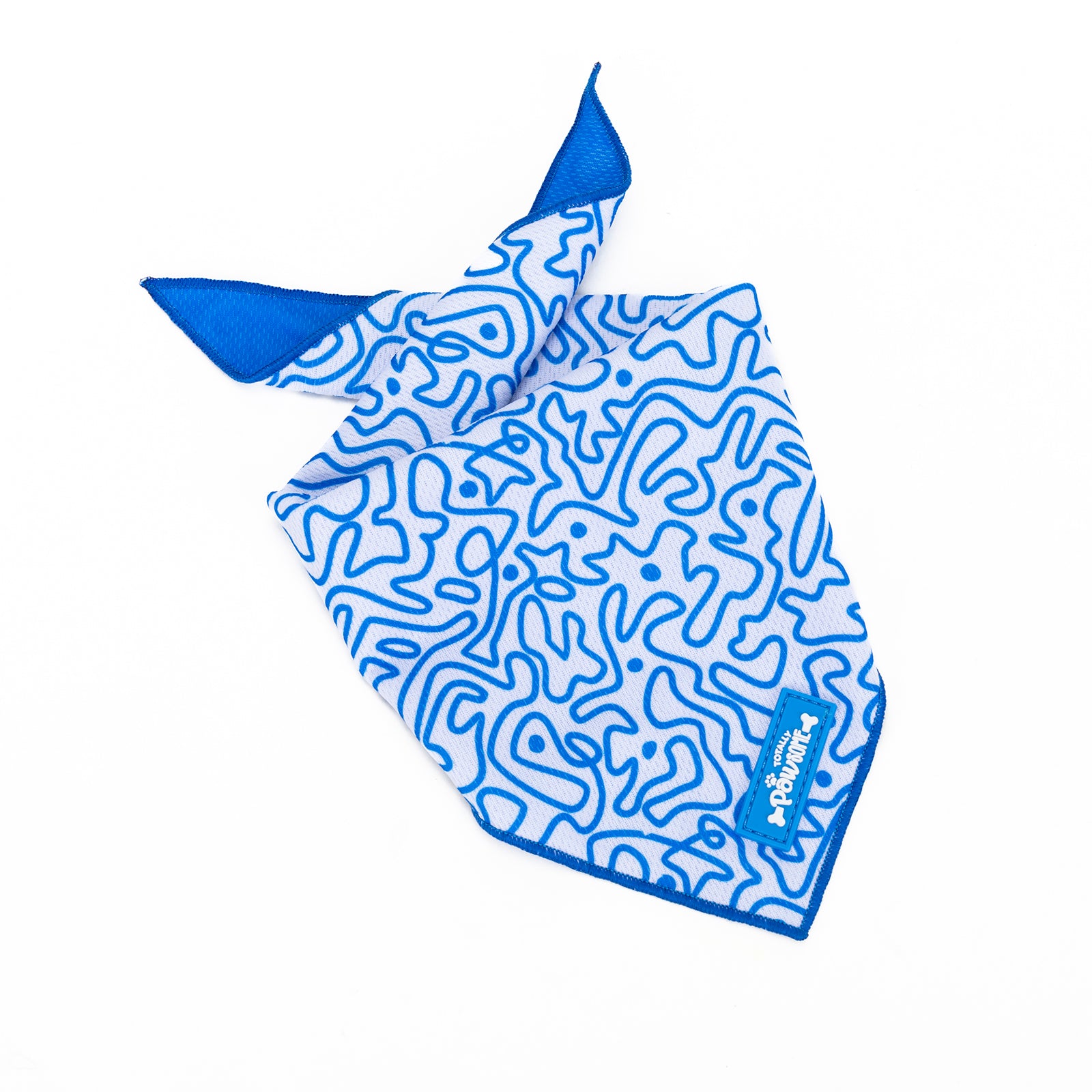 A blue and white swirly patterned bandana for dogs with a label showing the brand name.