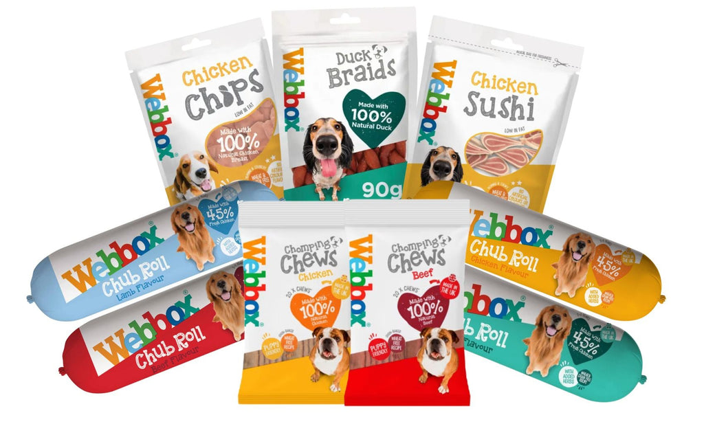 Assorted dog treat packages from Webbox brand on a white background