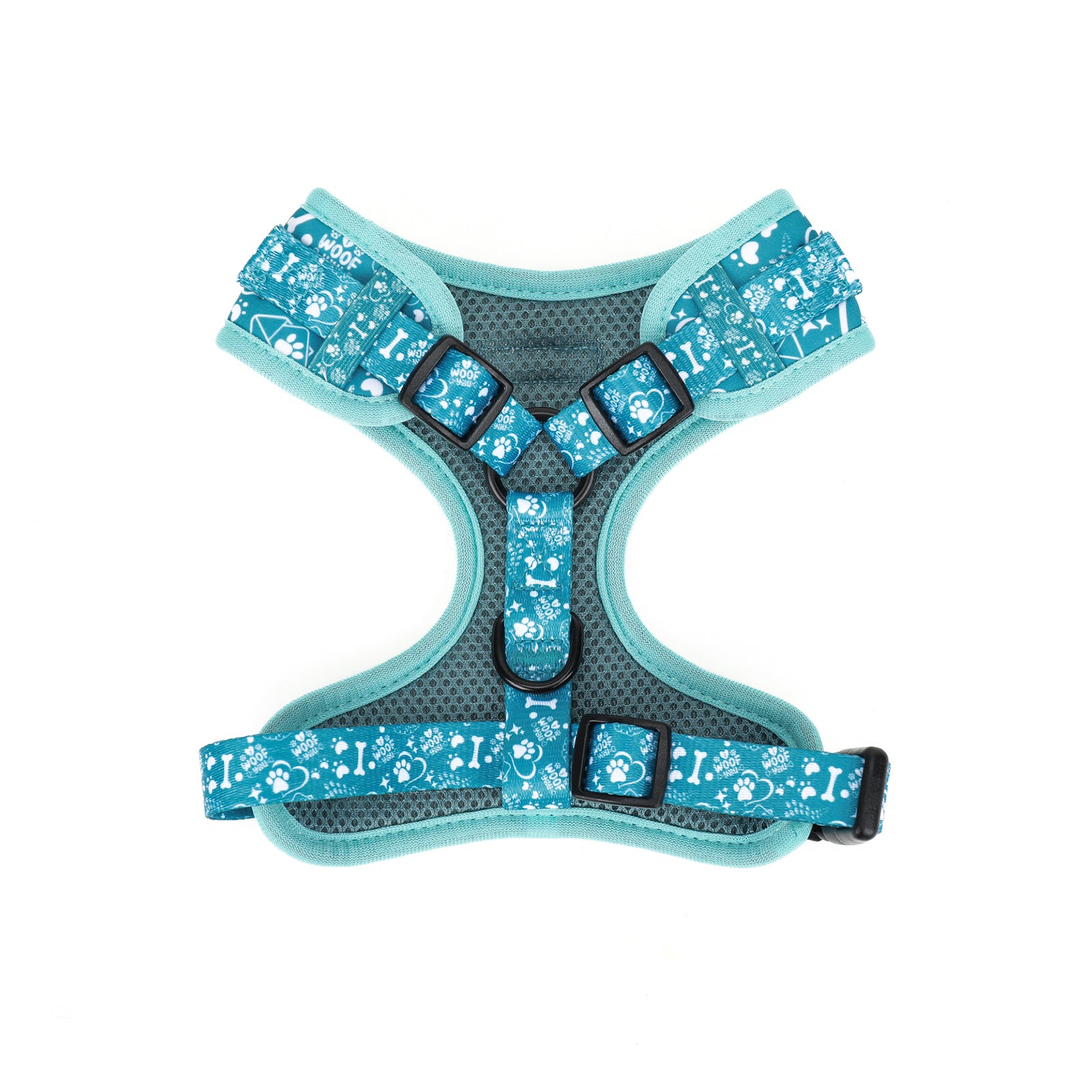 Dog harness with teal floral pattern on a white background