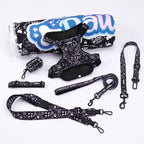 Black and white dog harness bundleon a white background