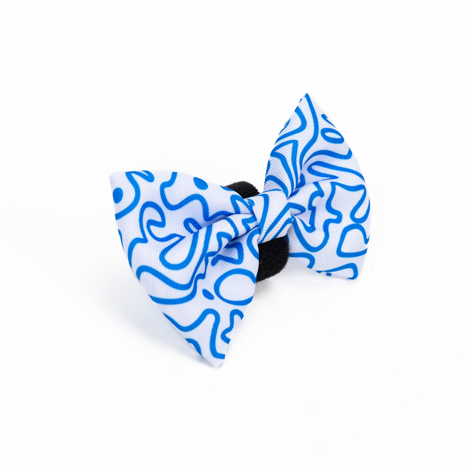 A blue and white swirly patterned bow tie designed for dogs, displayed on a white background.