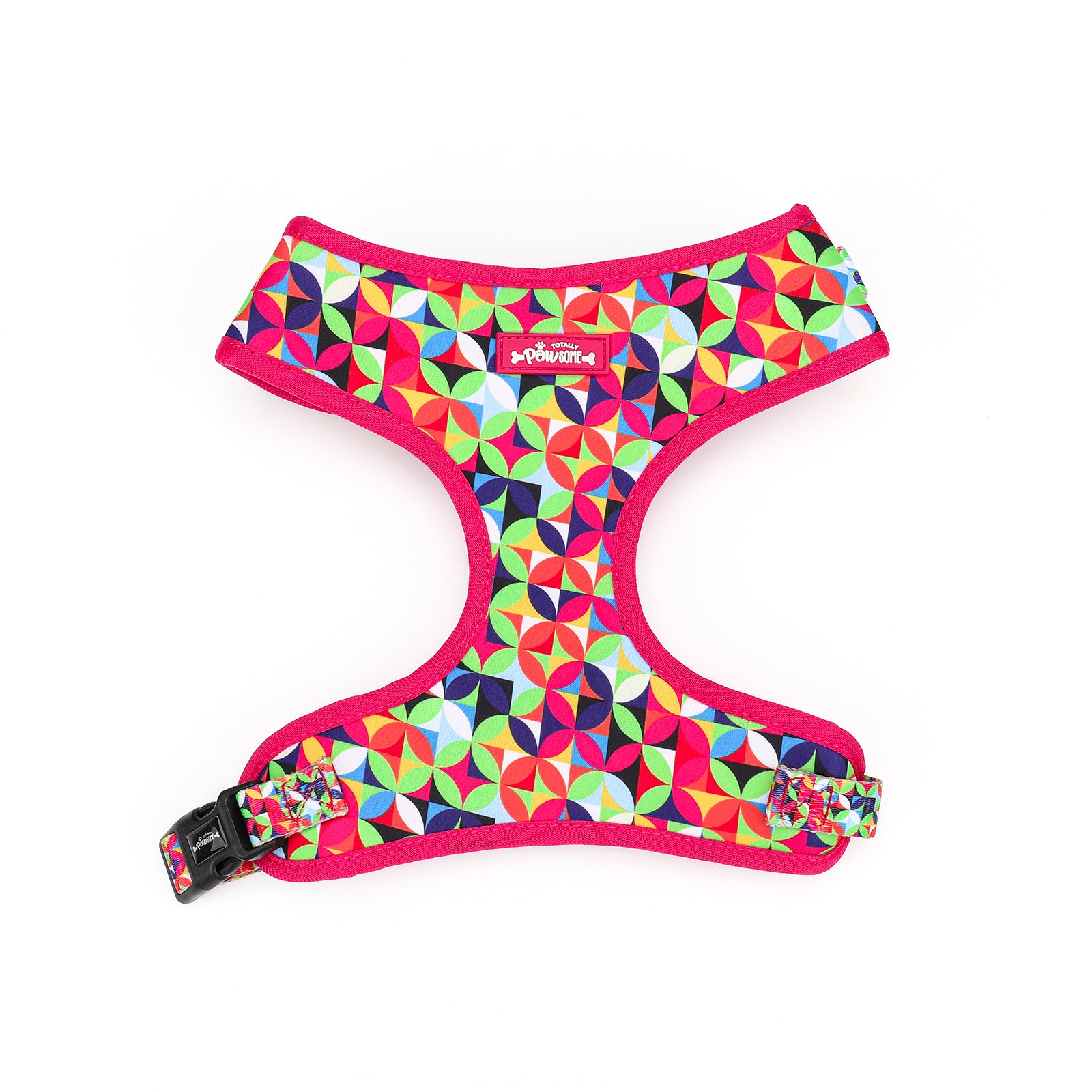 Colorful geometric patterned dog harness on a white background