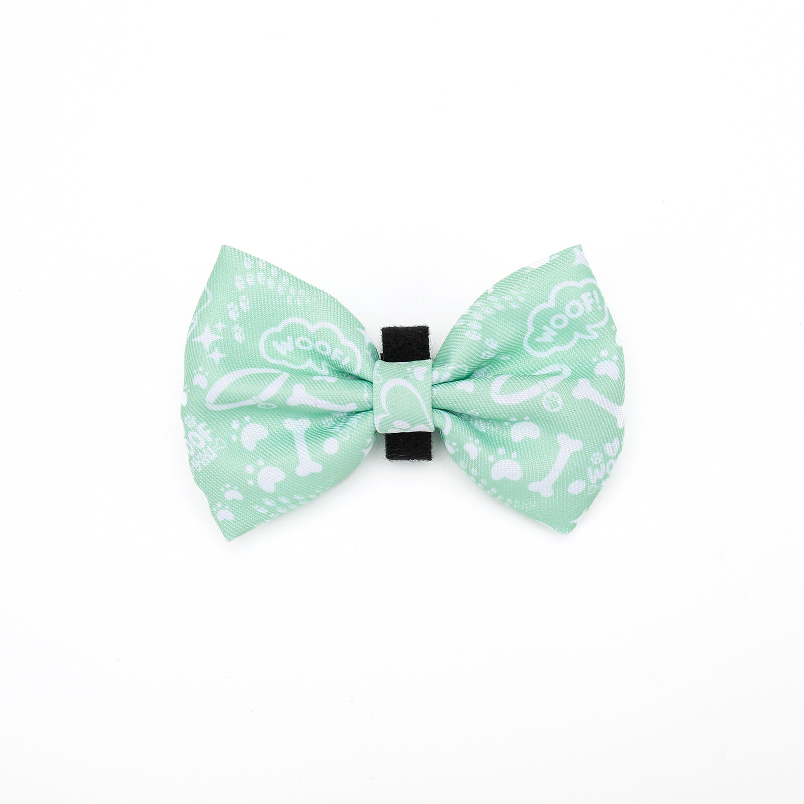 Green bow tie with white patterns on a white background