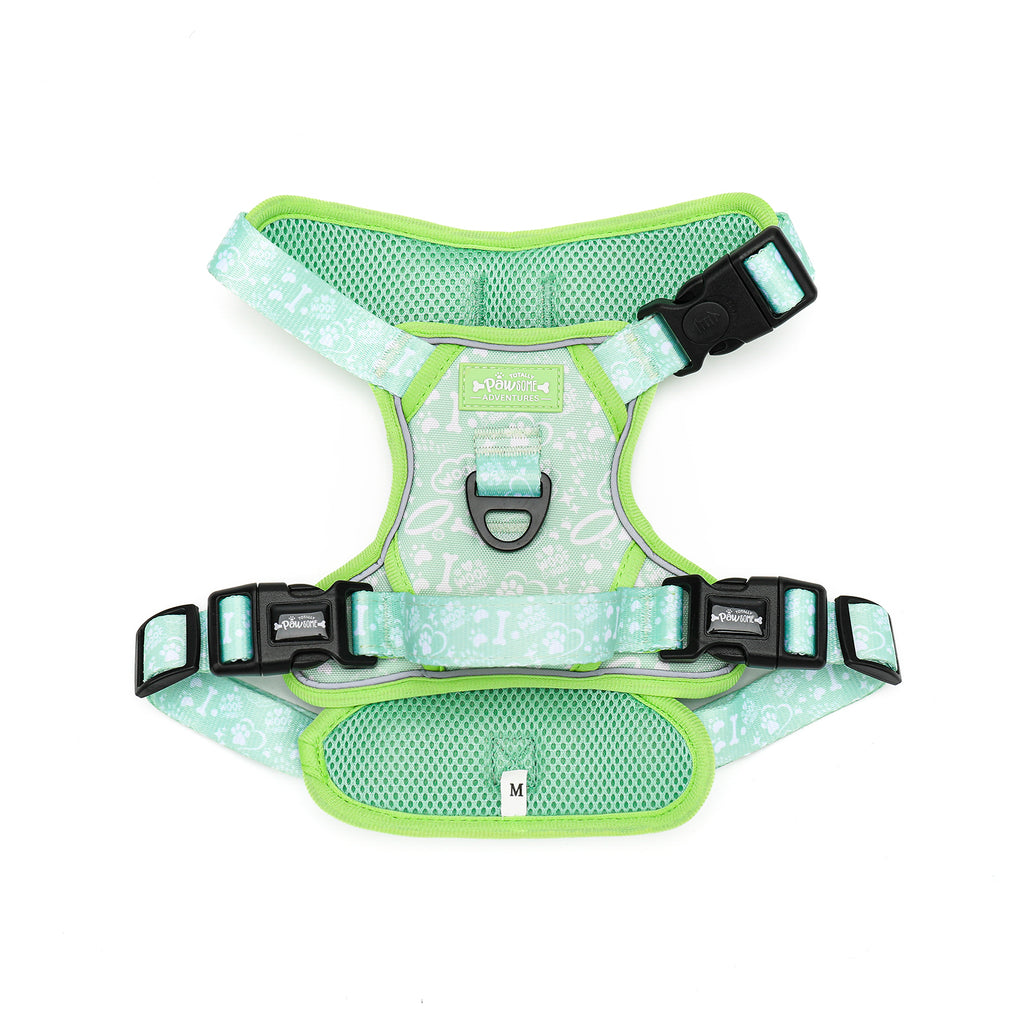 Green dog harness with reflective stripes on a white background