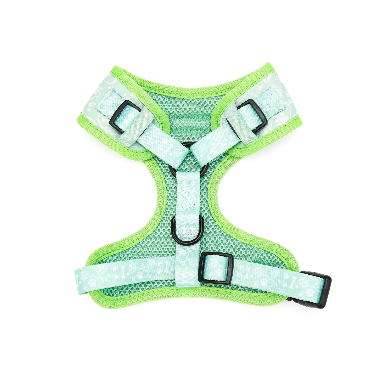 Dog harness with green border and reflective material on a white background