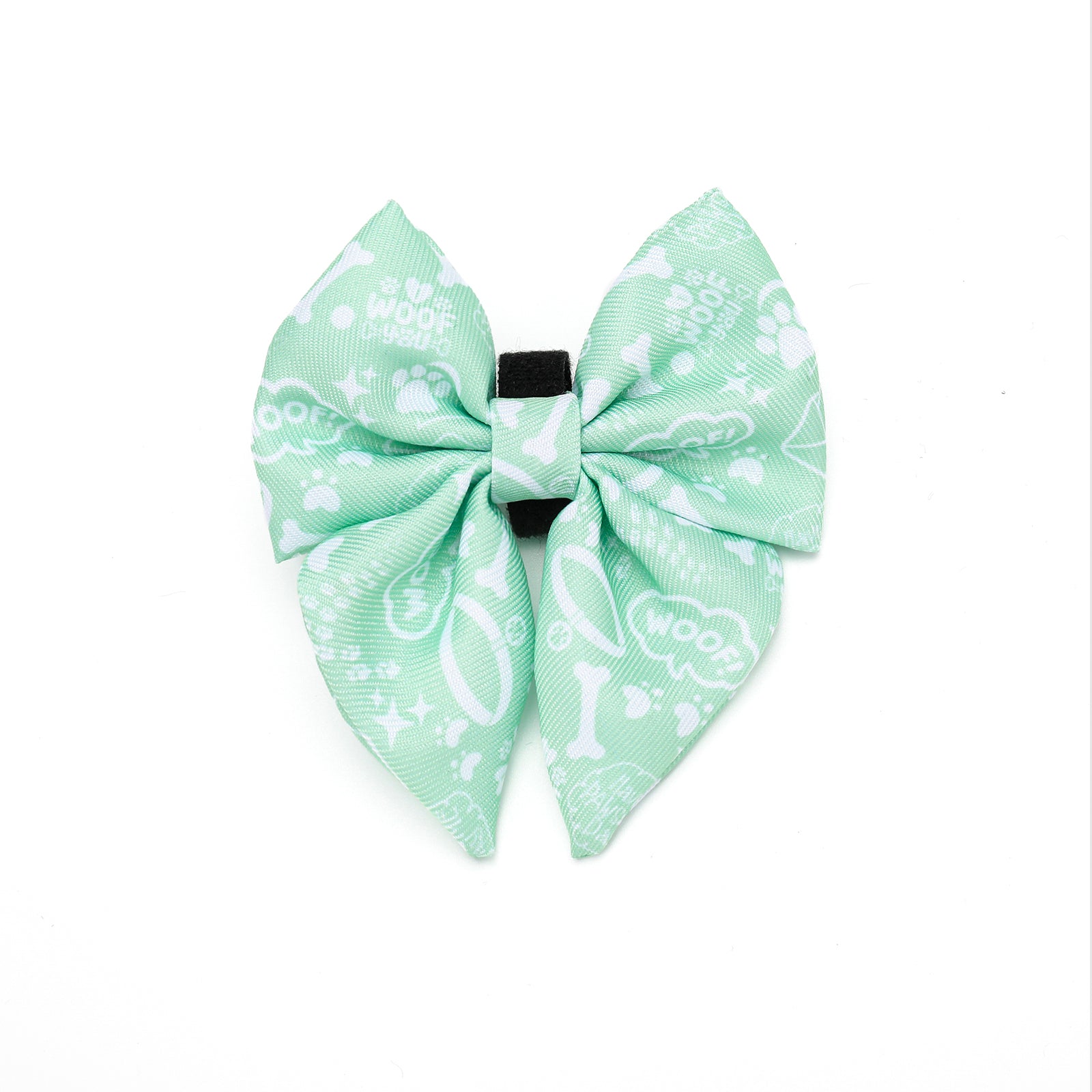 Light green bow with white patterns on a white background