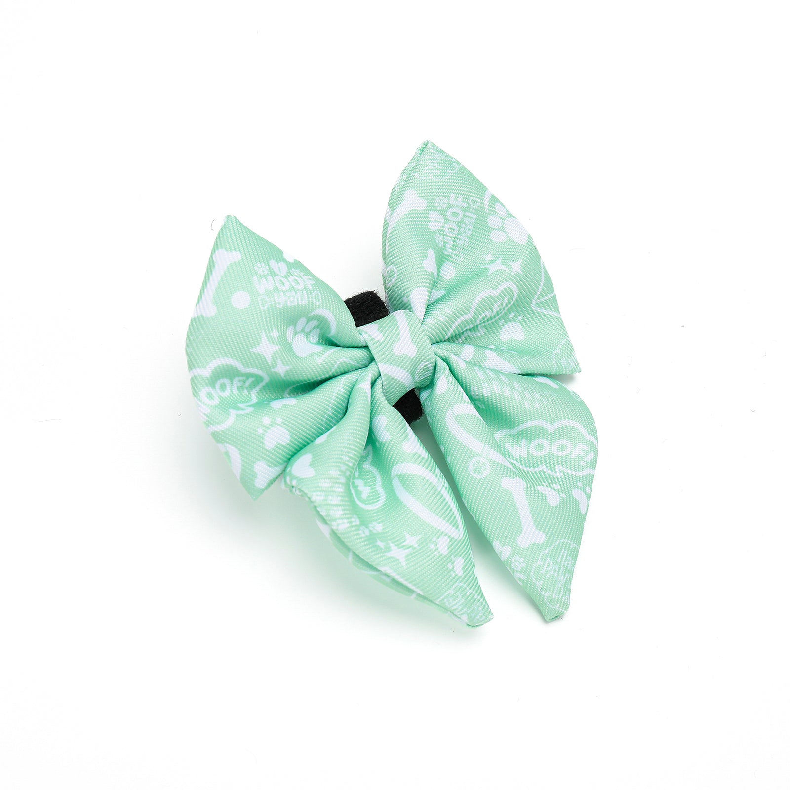 Light green dog bow tie with white patterns on a white background