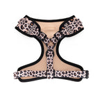 Dog harness with leopard print pattern on a white background