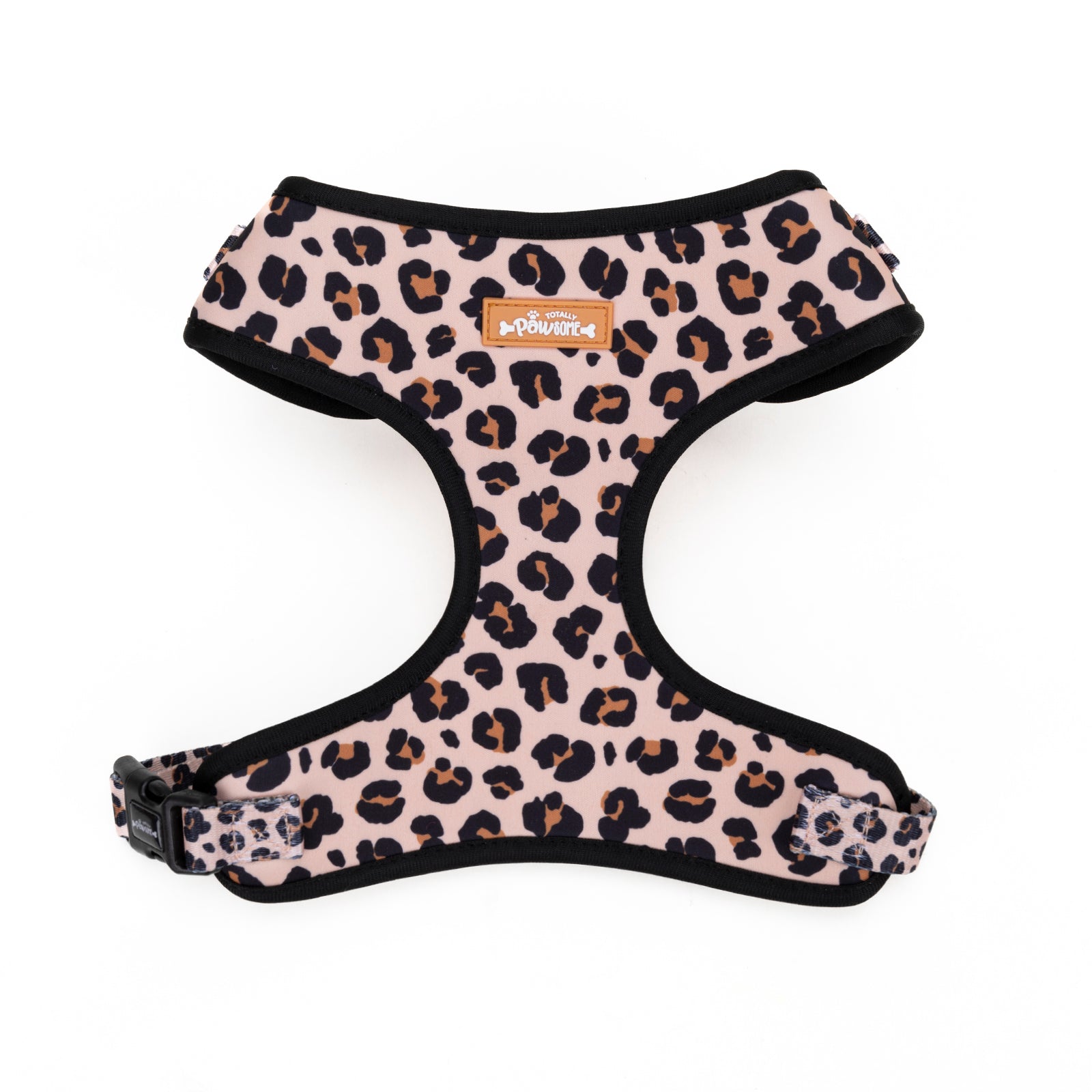 Leopard print dog harness on a white background