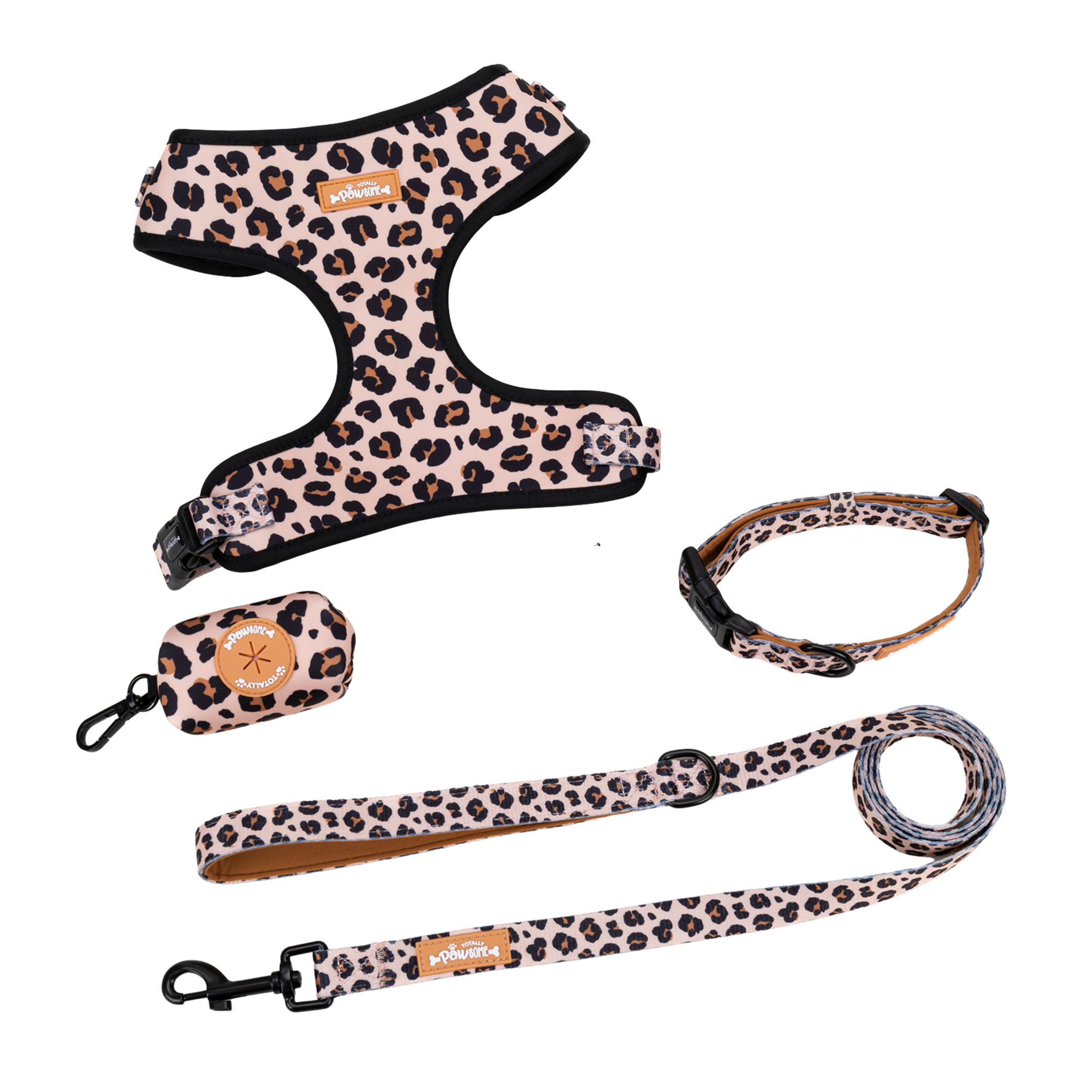 Leopard print dog harness, leash, and collar set on a white background