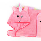 Close-up of Pink unicorn hood with horn and ears on pink Magical Unicorn‑pup Pawsome dog drying rob