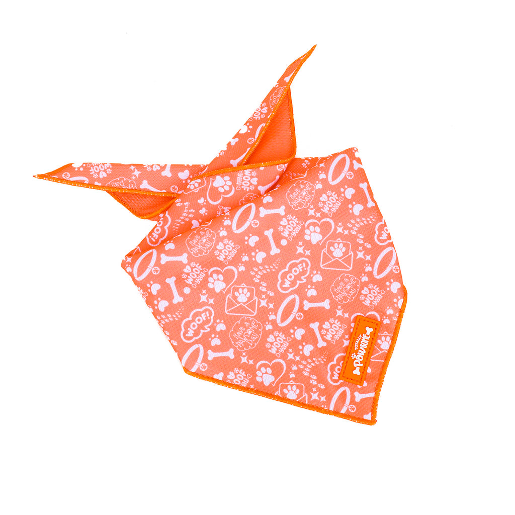 Orange dog bandana with white paw print pattern on a white background
