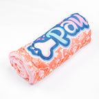 orange dog blanket rolled up showing the design