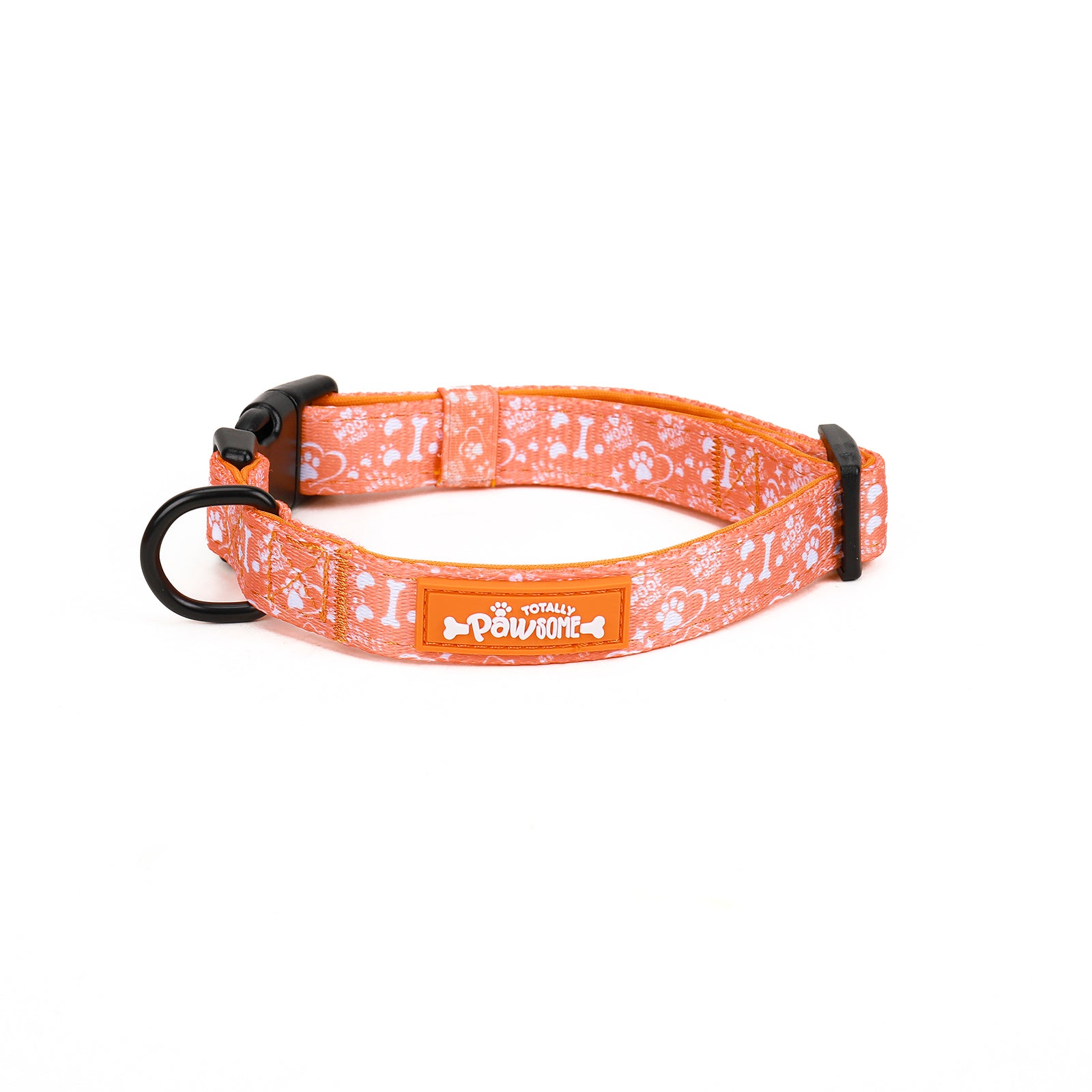 An orange dog collar with a pattern of paws and the text 'TP ADVENTURES' on it.
