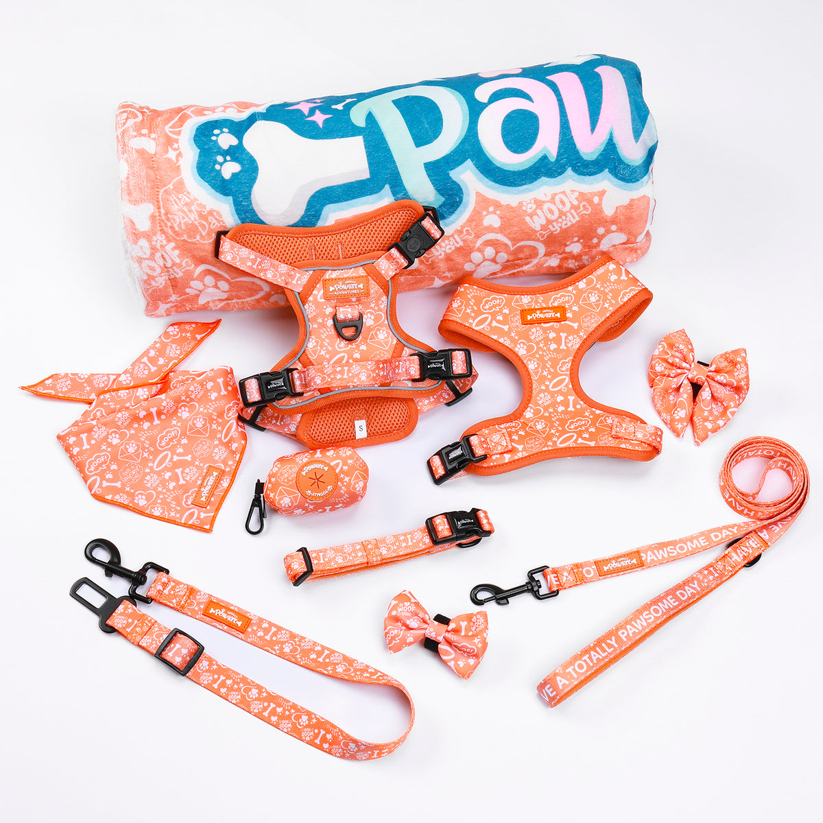 A collection of dog collars, lead, and a harness set from Sunburst Paws, predominantly in orange  colors 