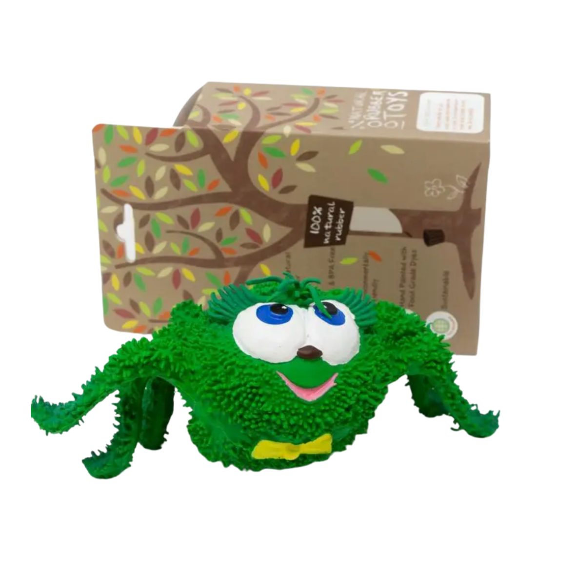 Green rubber toy with a box featuring a tree design in the background