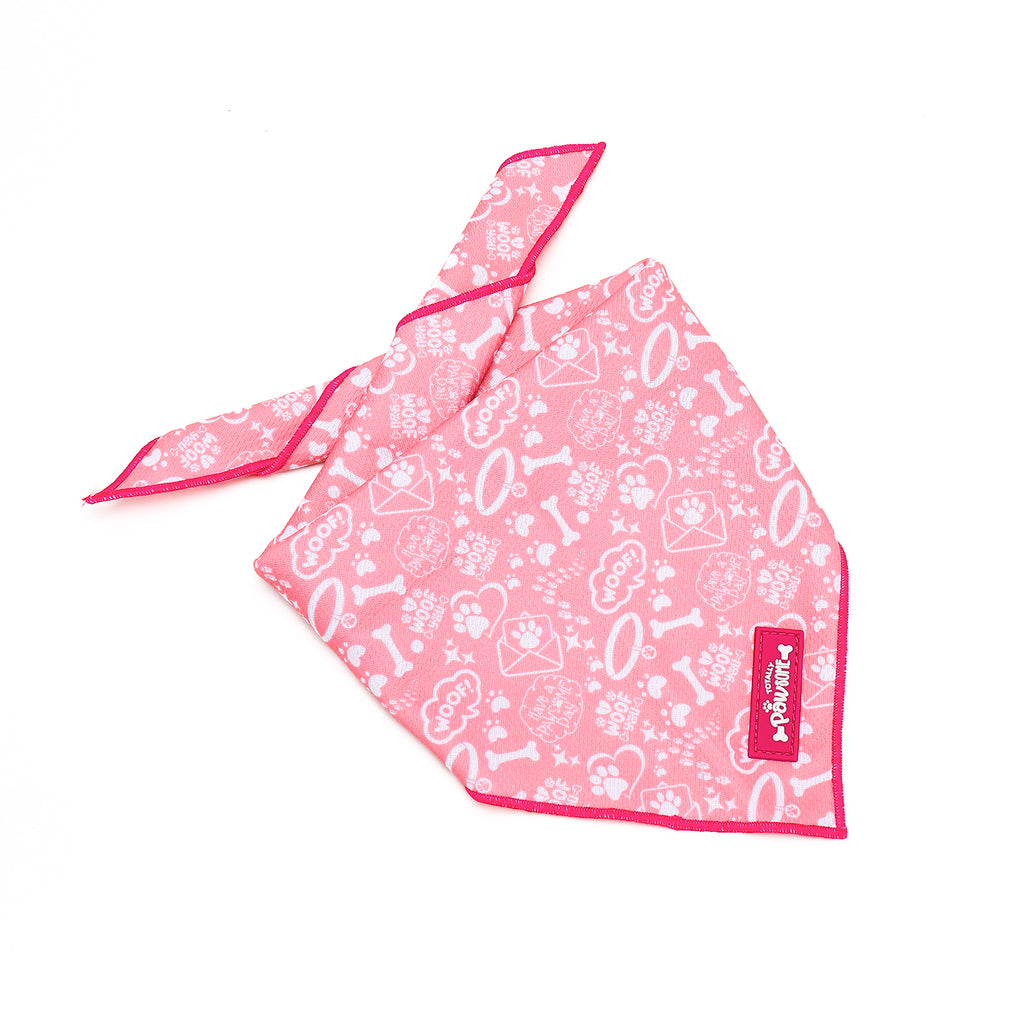Pink dog bandana with white patterns on a white background