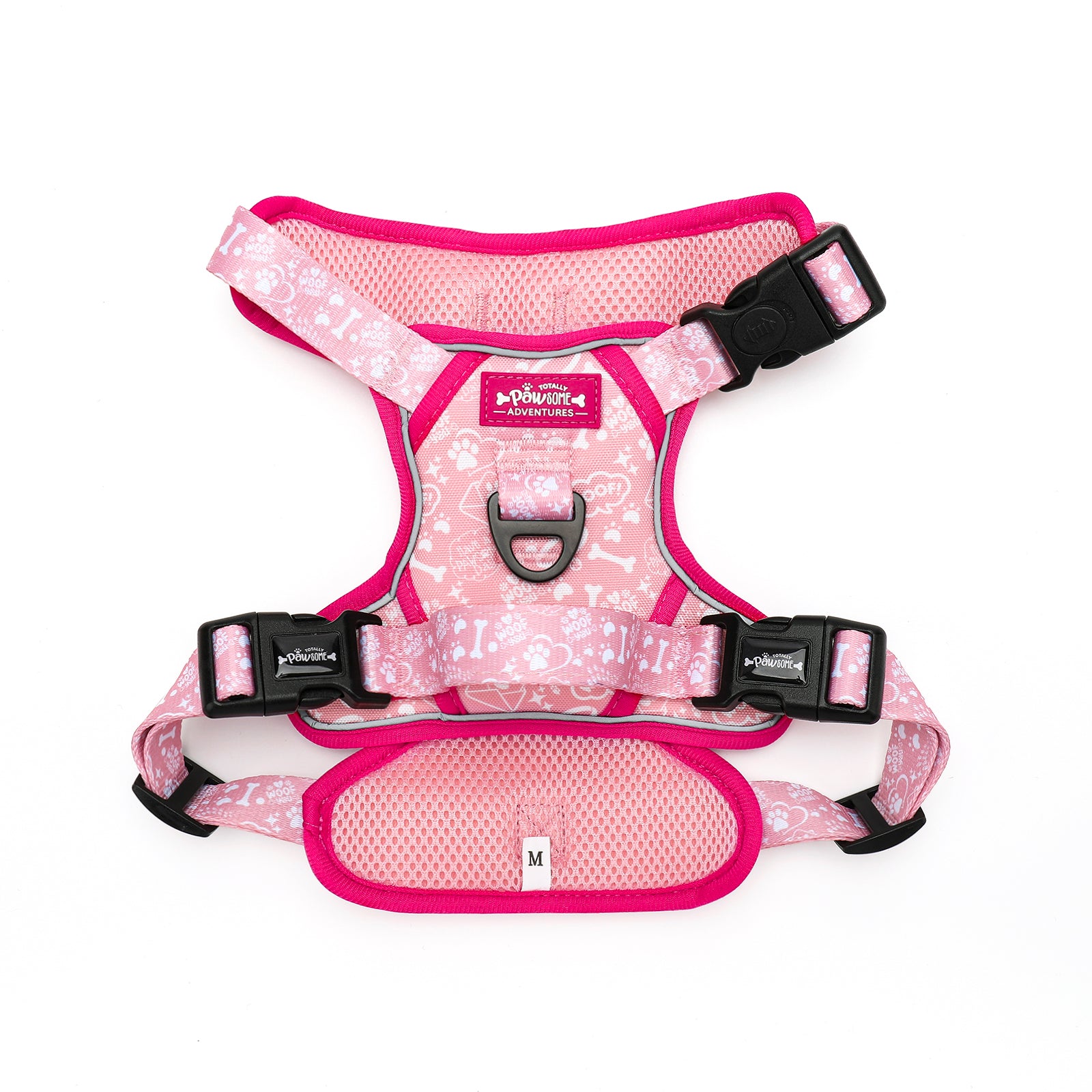 Pink dog harness with bone pattern on a white background