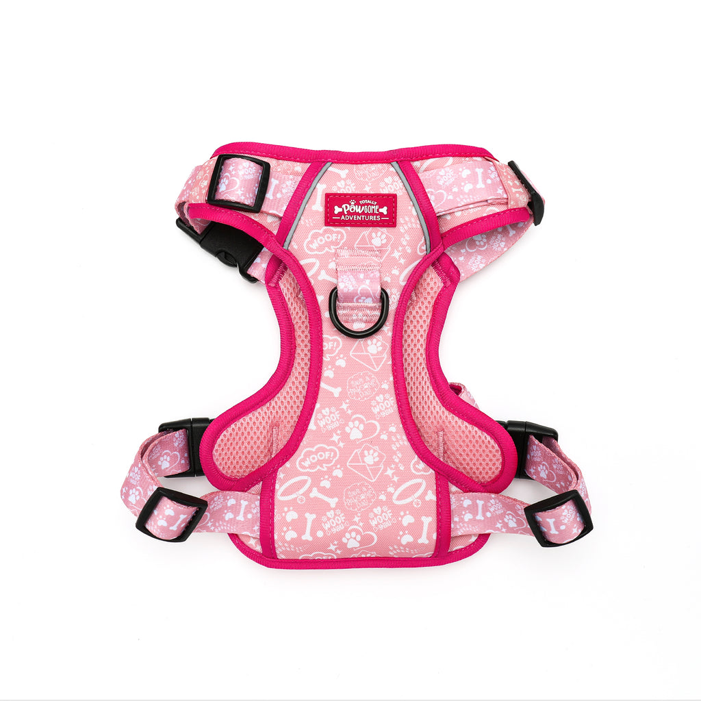 Pink dog harness with white patterns on a white background