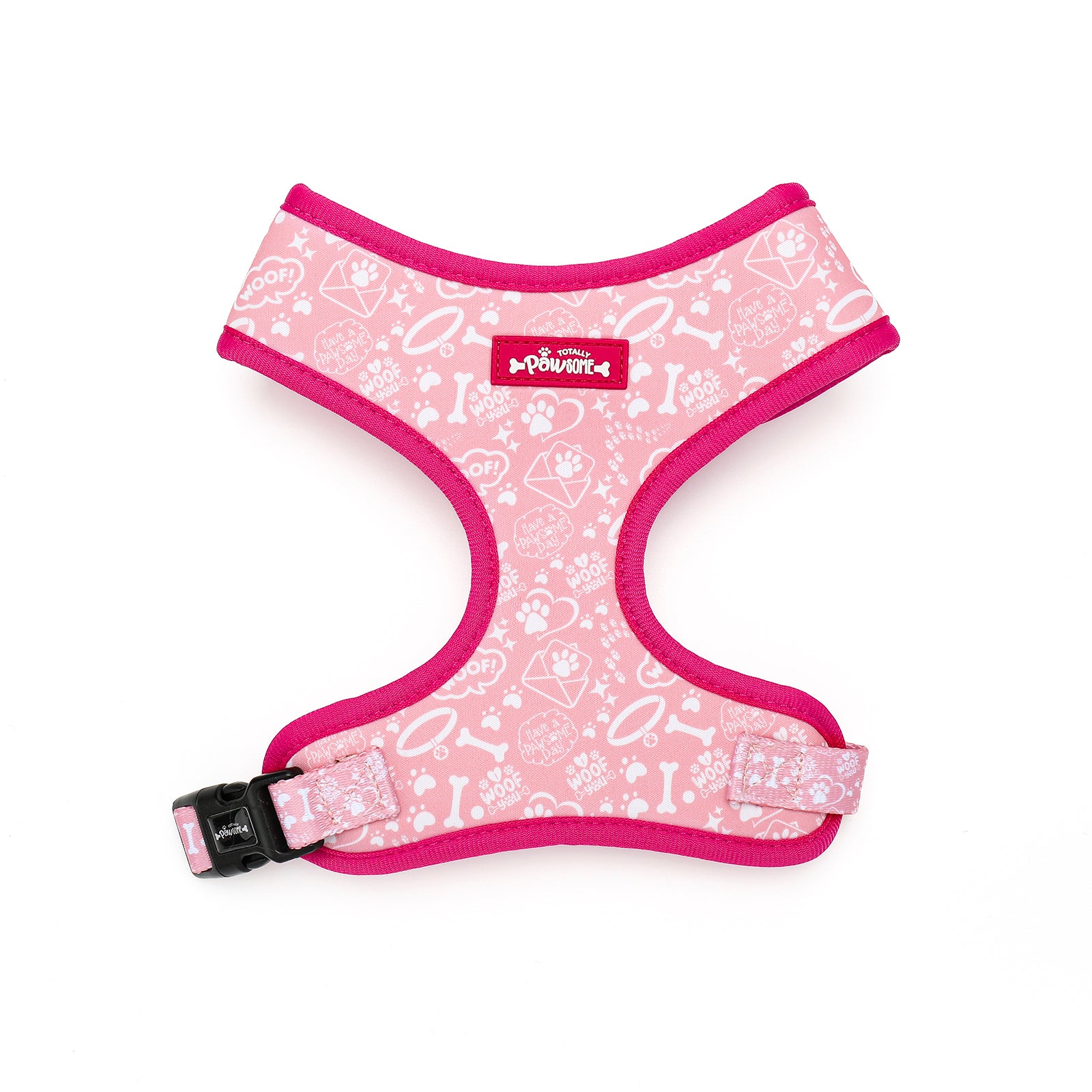 Pink dog harness with white patterns on a white background