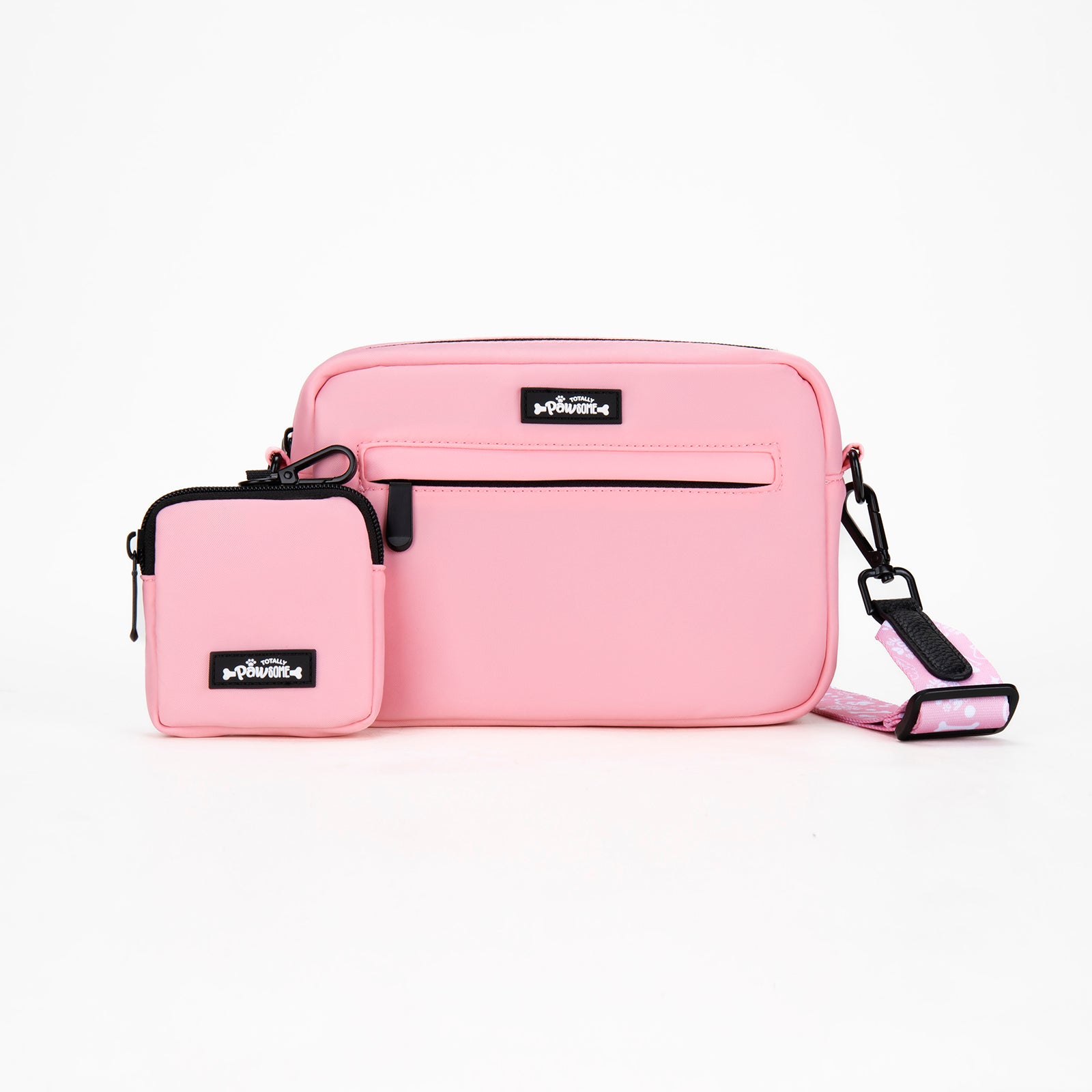 Pink crossbody bag with matching pouch on a white background