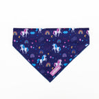 Purple bandana with unicorn and rainbow pattern on a white background