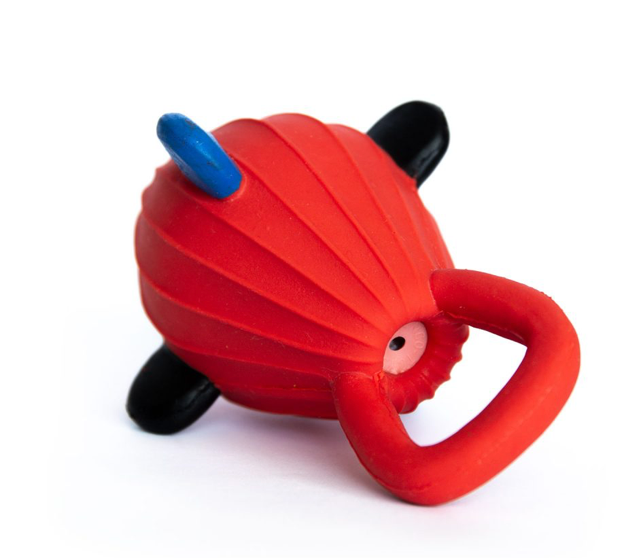 Red and blue toy with a handle on a white background