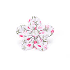 dog flower bowtie with pink flowers on a white background