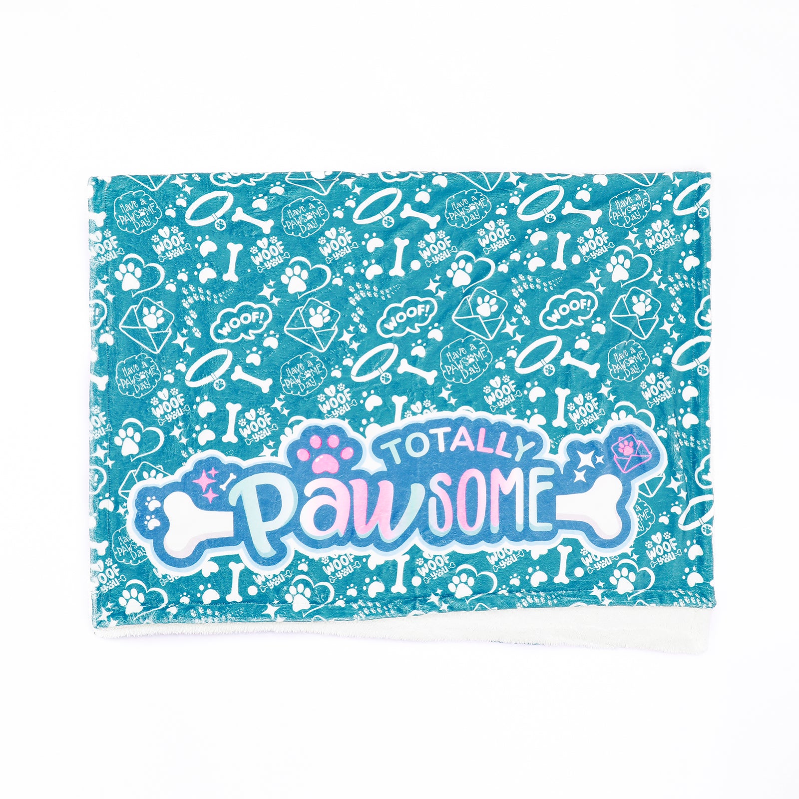 A teal fleece blanket with a pattern of paws and bones, and the text 'Totally Pawsome' across the center.