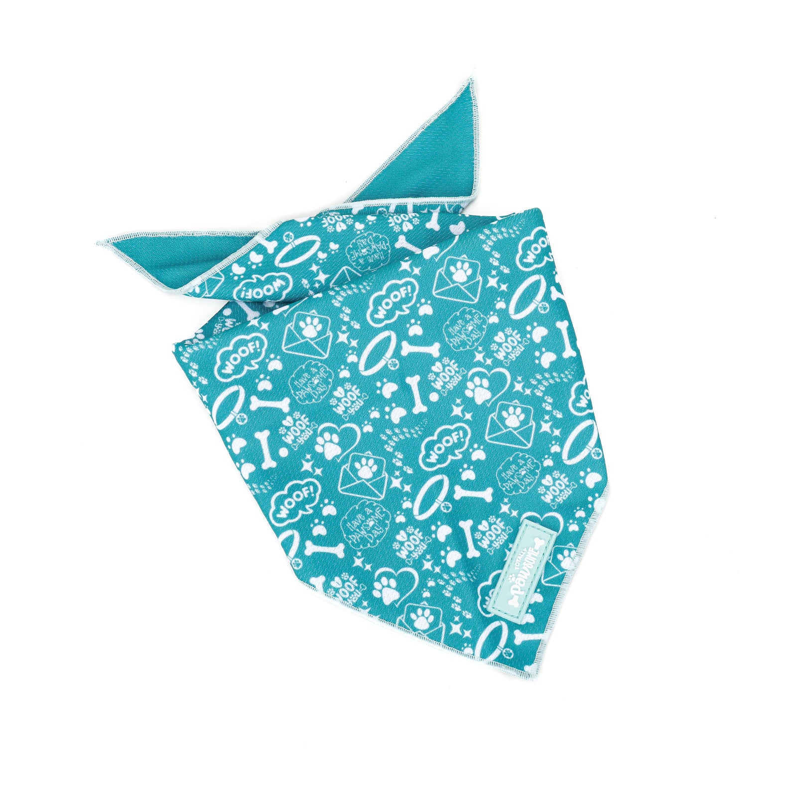 A teal blue dog bandana with a pattern of bones and paws, tied at the neck.