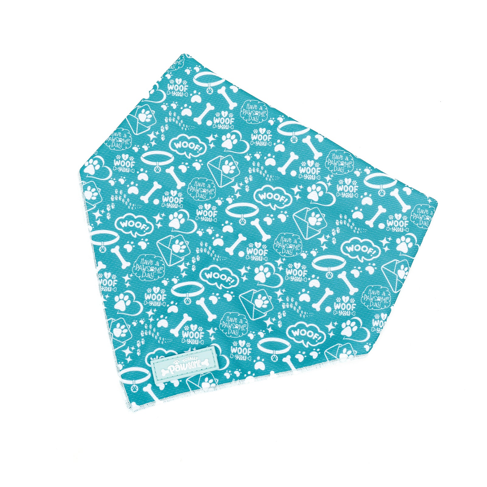 A teal dog bandana with a pattern of bones and paws, tied at the neck.