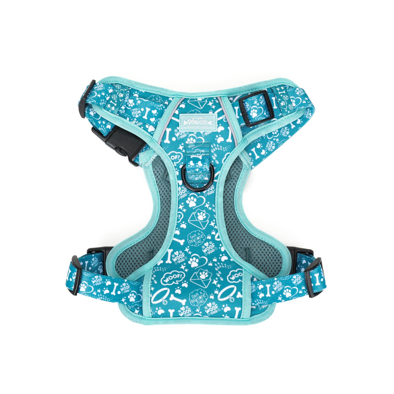 teal dog harness with white patterns on a white background